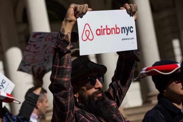 A pro-Airbnb rally outside City Hall in October 2015.